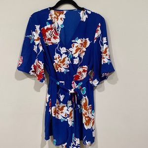Adorable cobalt blue floral print romper.